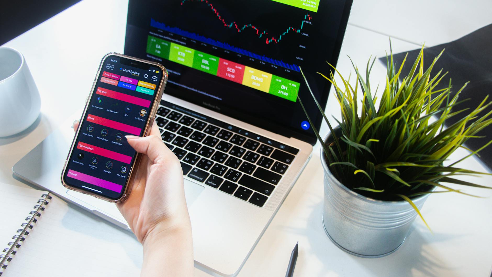 Modern trading technology setup with multiple monitors